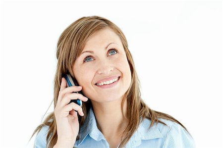 Charismatic businesswoman talking on phone against white background Stock Photo - Budget Royalty-Free & Subscription, Code: 400-04210512