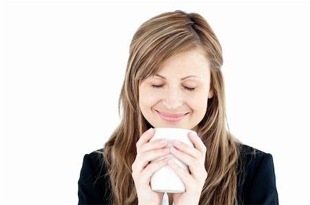 simsearch:400-04188263,k - Beautiful businesswoman enjoying her coffee against white background Foto de stock - Super Valor sin royalties y Suscripción, Código: 400-04210525