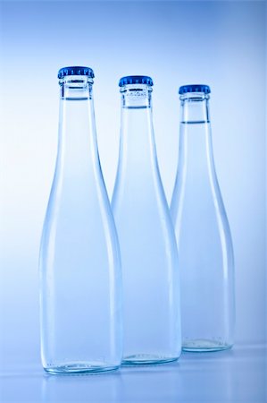 simsearch:400-06796544,k - Fresh water drink on blue background Stock Photo - Budget Royalty-Free & Subscription, Code: 400-04210693