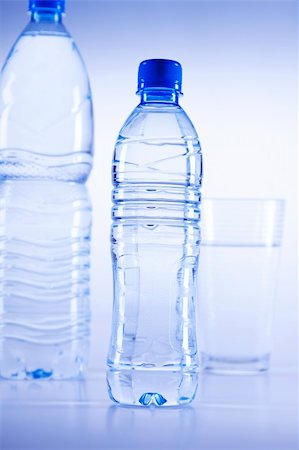 simsearch:400-04575721,k - Fresh water drink on blue background Stock Photo - Budget Royalty-Free & Subscription, Code: 400-04211025