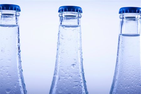 simsearch:400-06796544,k - Fresh water drink on blue background Stock Photo - Budget Royalty-Free & Subscription, Code: 400-04211020