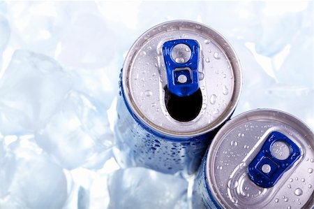 simsearch:400-07168576,k - Energy drink can on blue background Stock Photo - Budget Royalty-Free & Subscription, Code: 400-04211135