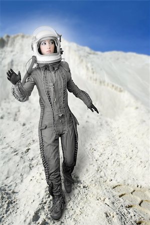 surreal space - astronaut woman futuristic metaphor moon out space planets Stock Photo - Budget Royalty-Free & Subscription, Code: 400-04212200