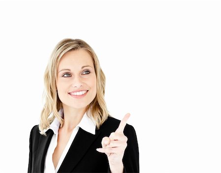 Bright young businesswoman showing a direction with a finger against a white background Stock Photo - Budget Royalty-Free & Subscription, Code: 400-04212325