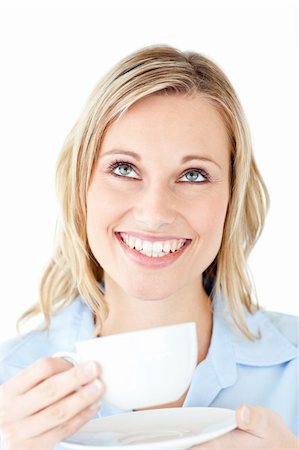 simsearch:400-04188263,k - Cheerful businesswoman holding a cup of coffee against a white background Foto de stock - Super Valor sin royalties y Suscripción, Código: 400-04212348