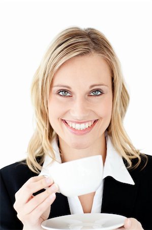 simsearch:400-04188263,k - Merry businesswoman holding a cup of coffee against a white background Foto de stock - Super Valor sin royalties y Suscripción, Código: 400-04212368