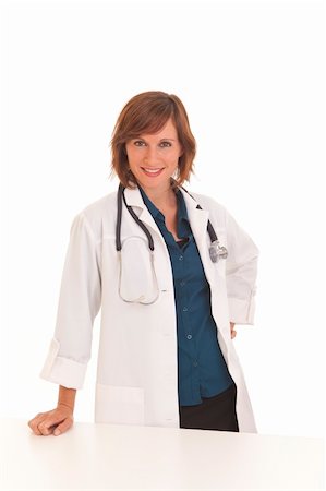 simsearch:400-04018969,k - Portrait of young woman doctor with white coat crossing arms Foto de stock - Royalty-Free Super Valor e Assinatura, Número: 400-04212466