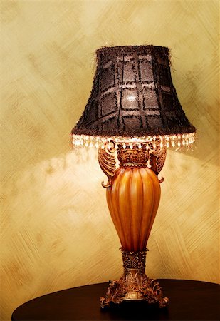 simsearch:400-05288850,k - A vintage lamp on a dark wooden table Stock Photo - Budget Royalty-Free & Subscription, Code: 400-04212720