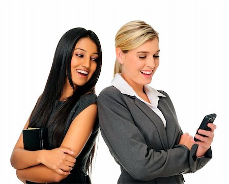 diversity indian workers - Attractive business women look at cell phone Stock Photo - Budget Royalty-Free & Subscription, Code: 400-04213357