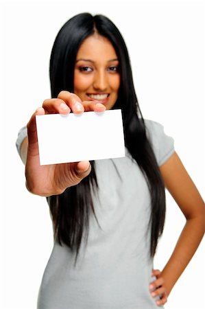 Indian girl shows her business card to camera. Foto de stock - Super Valor sin royalties y Suscripción, Código: 400-04213376