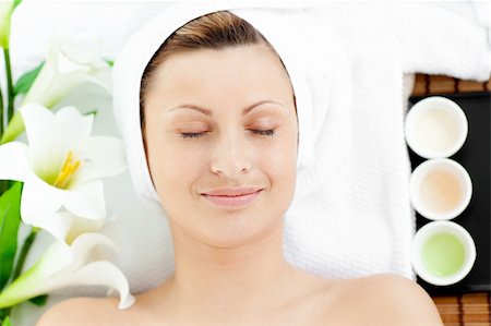 simsearch:400-04044944,k - Happy young woman resting on a massage table in a spa center Stock Photo - Budget Royalty-Free & Subscription, Code: 400-04213383