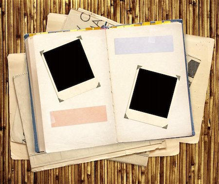 simsearch:400-05290756,k - Old book and two retro photoframe Stock Photo - Budget Royalty-Free & Subscription, Code: 400-04213748