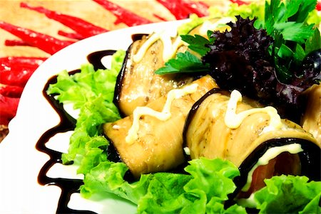 simsearch:400-05259212,k - Appetizer made of rolled egg-plants served with salad Stock Photo - Budget Royalty-Free & Subscription, Code: 400-04224109