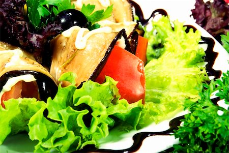 simsearch:400-05259212,k - Appetizer made of rolled egg-plants served with salad Stock Photo - Budget Royalty-Free & Subscription, Code: 400-04224110