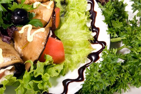 simsearch:400-05259212,k - Appetizer made of rolled egg-plants served with salad Stock Photo - Budget Royalty-Free & Subscription, Code: 400-04224112