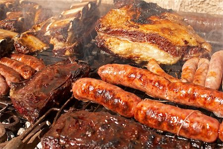 Typical argentinian barbecue with  several types of meat Photographie de stock - Aubaine LD & Abonnement, Code: 400-04224153