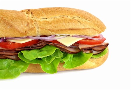 simsearch:400-05255035,k - Giant ham, tomato, lettuce, cheese and onion sub ready to serve. Stock Photo - Budget Royalty-Free & Subscription, Code: 400-04224381