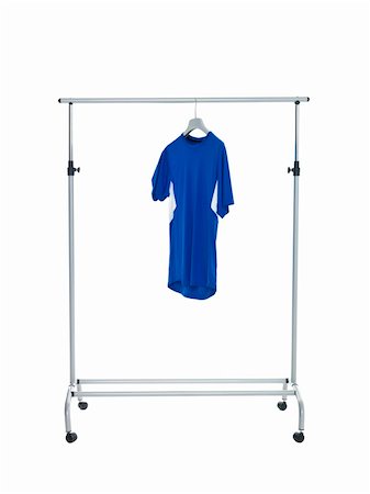 dresses closet - Lonely blue shirt on a Dress Rack isolated on white background Photographie de stock - Aubaine LD & Abonnement, Code: 400-04225210