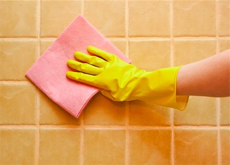 simsearch:400-04615992,k - hand in yellow glove with rag, washing tiled wall Fotografie stock - Microstock e Abbonamento, Codice: 400-04225231