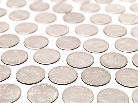 Arranged Quarter coins on white background Stockbilder - Microstock & Abonnement, Bildnummer: 400-04225554