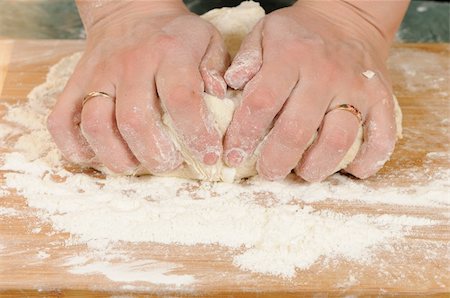 Preparation of the dough for a baking of rolls Fotografie stock - Microstock e Abbonamento, Codice: 400-04225821