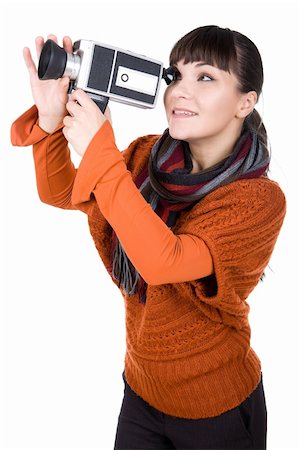 young adult woman with retro camera. over white background Stock Photo - Budget Royalty-Free & Subscription, Code: 400-04225947