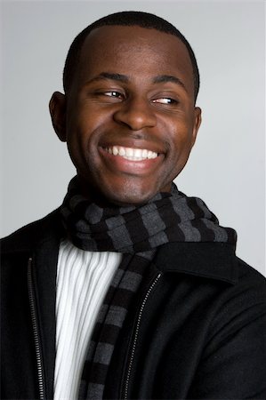 simsearch:400-08036451,k - Smiling black man wearing scarf Stock Photo - Budget Royalty-Free & Subscription, Code: 400-04226417