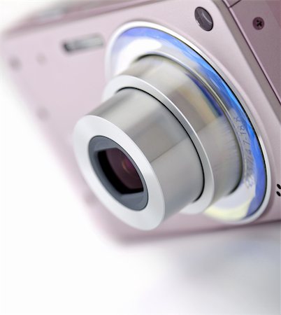 simsearch:400-05179794,k - Pink digital compact camera on a white background Stock Photo - Budget Royalty-Free & Subscription, Code: 400-04226438