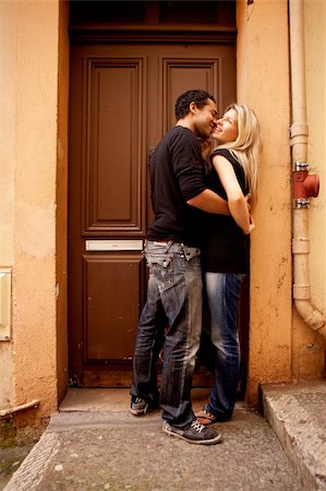 simsearch:400-04549295,k - A couple having fun and flirting in an European French Street Foto de stock - Royalty-Free Super Valor e Assinatura, Número: 400-04227010