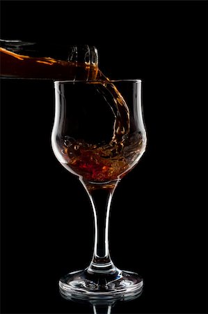 simsearch:400-04232915,k - Red wine being poured into a wine glass Stock Photo - Budget Royalty-Free & Subscription, Code: 400-04227075