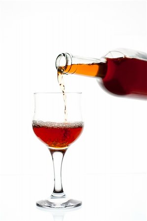 simsearch:400-04935153,k - Red wine being poured into a wine glass Photographie de stock - Aubaine LD & Abonnement, Code: 400-04227072