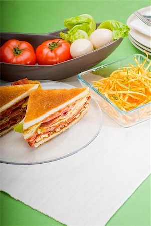 simsearch:400-04798472,k - fresh and delicious classic club sandwich over a transparent glass dish Stock Photo - Budget Royalty-Free & Subscription, Code: 400-04227520