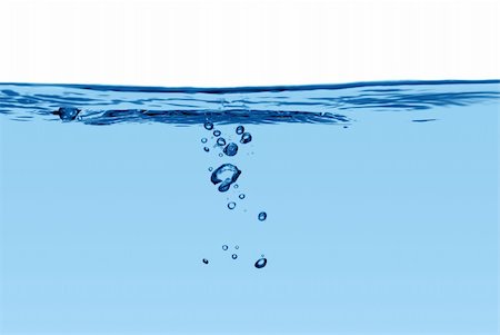 Blue water line with air bubbles isolated on a white background. Foto de stock - Super Valor sin royalties y Suscripción, Código: 400-04227535