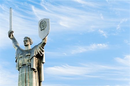 soviet war memorial - soviet motherland monument against cloudy blue sky background (Kiev, Ukraine) Stock Photo - Budget Royalty-Free & Subscription, Code: 400-04227618