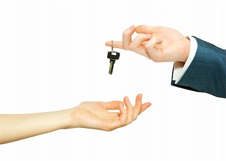 simsearch:400-05361671,k - hand holds a key isolated on white Stock Photo - Budget Royalty-Free & Subscription, Code: 400-04229114