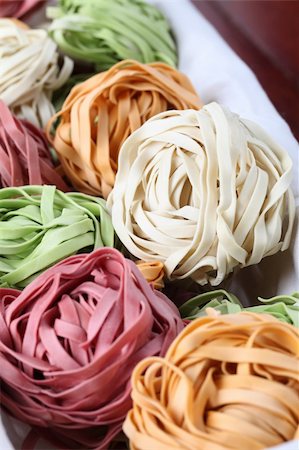 simsearch:673-02140855,k - Assortment of colorful tagliatelle pasta dyed with natural dye from carrots, potatoes, spinach and beetroot Stock Photo - Budget Royalty-Free & Subscription, Code: 400-04229197