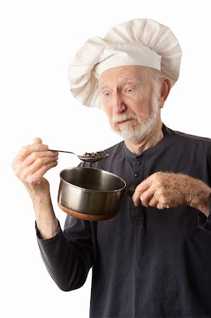 simsearch:400-04227846,k - Funny senior chef with big white hat and pot of beans Fotografie stock - Microstock e Abbonamento, Codice: 400-04229284
