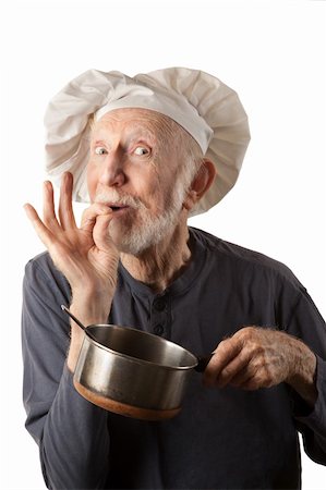 simsearch:400-04227846,k - Funny senior chef with big white hat and pot of beans Fotografie stock - Microstock e Abbonamento, Codice: 400-04229285