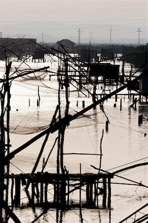 simsearch:400-04935476,k - silhouette of old fishing nets, Ulcinj, Montenegro Fotografie stock - Microstock e Abbonamento, Codice: 400-04229325