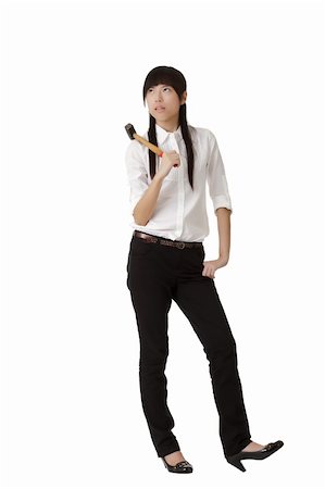 simsearch:400-04255435,k - Angry business woman holding hammer on shoulder isolated over white. Foto de stock - Super Valor sin royalties y Suscripción, Código: 400-04229663