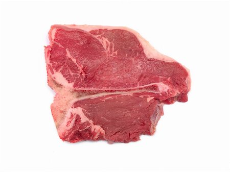 A T Bone steak isolated against a white background Stock Photo - Budget Royalty-Free & Subscription, Code: 400-04220163