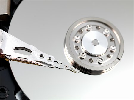 simsearch:400-03992953,k - An internal computer hard drive isolated against a white background Stock Photo - Budget Royalty-Free & Subscription, Code: 400-04220299