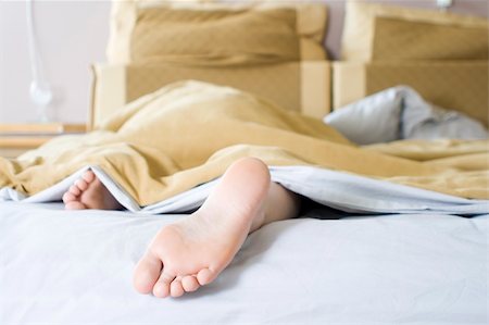 Girl lazying in bed on a Sunday morning Stock Photo - Budget Royalty-Free & Subscription, Code: 400-04221662
