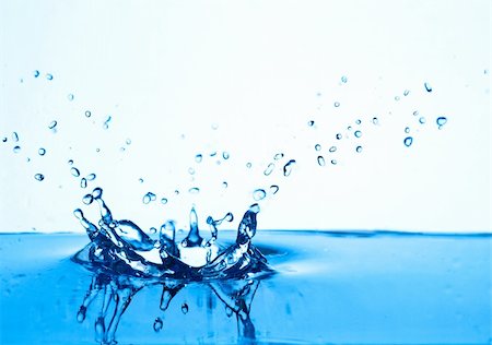 simsearch:614-06624533,k - Blue water splashing isolated on white background. Foto de stock - Super Valor sin royalties y Suscripción, Código: 400-04221671