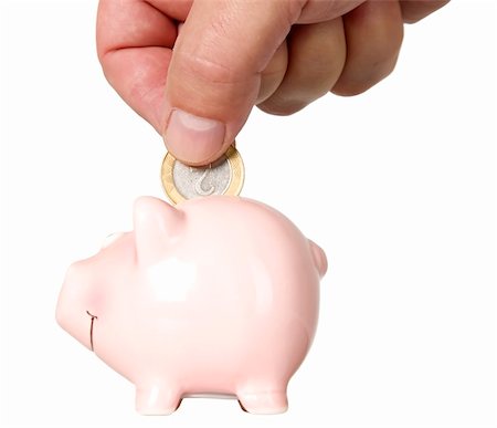 Man is putting money into saving pig, finance theme Stockbilder - Microstock & Abonnement, Bildnummer: 400-04222848
