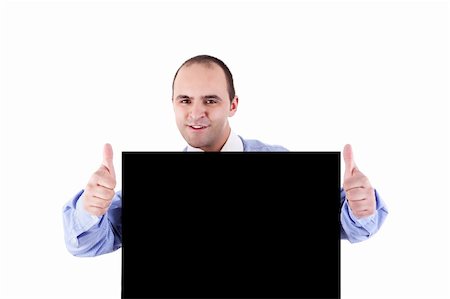 employee hold a sign - Young businessman holding a blackboard displaying the sign of success Stock Photo - Budget Royalty-Free & Subscription, Code: 400-04223228
