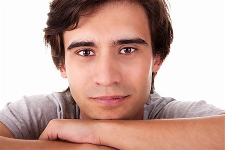 simsearch:400-06477858,k - Portrait of a handsome young man thinking Stock Photo - Budget Royalty-Free & Subscription, Code: 400-04223355