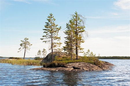 simsearch:400-04804407,k - Small rocky island on lake on sunday Stock Photo - Budget Royalty-Free & Subscription, Code: 400-04223450