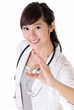 Attractive young medical doctor woman give ok gesture with smiling. Stock Photo - Budget Royalty-Free & Subscription, Code: 400-04223778