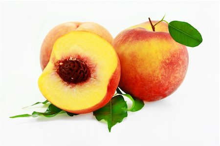 Peaches on a white background Fotografie stock - Microstock e Abbonamento, Codice: 400-04234180